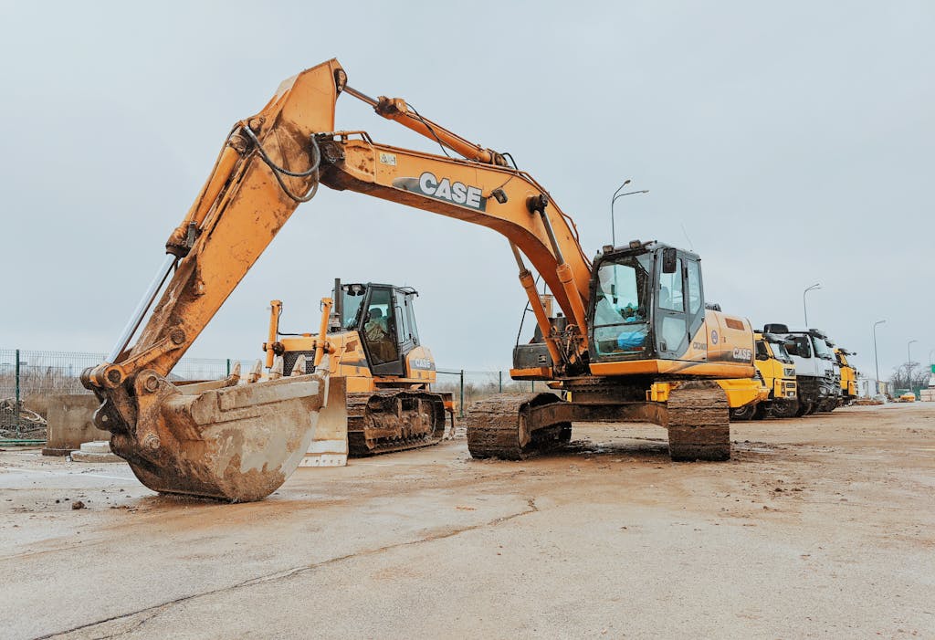 Excavator on street in industrial district